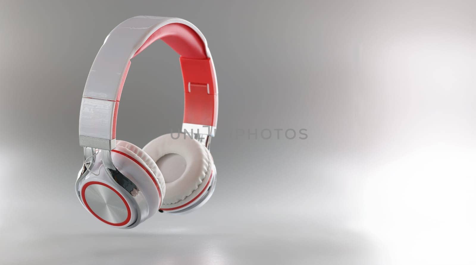 Gray bluetooth wireless headphones, close-up. Stylish accessory for listening to music. Clear sound headphone