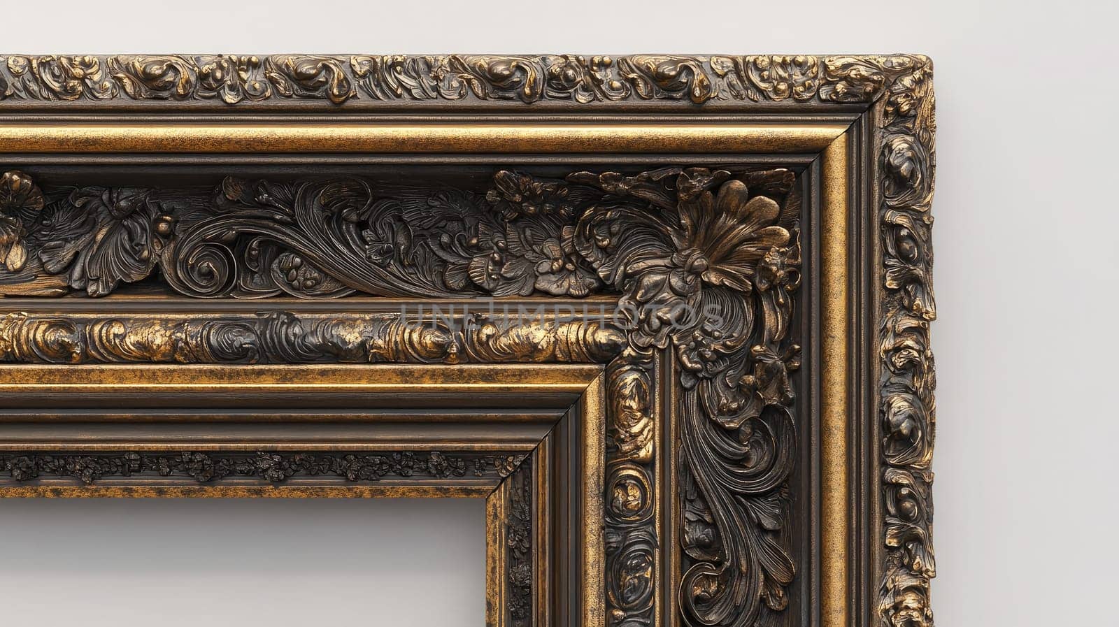 A detailed antique picture frame features elaborate carvings and a blend of dark and gold finishes, showcasing fine craftsmanship.