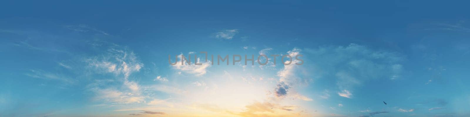 Bright sunset sky panorama with Cirrus clouds. Seamless hdr spherical equirectangular 360 panorama. Sky dome or zenith for 3D visualization, game and sky replacement for aerial drone 360 panoramas.