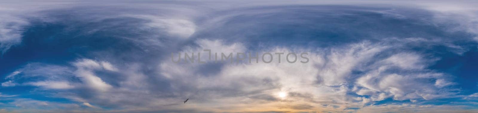 Blue sky with Cirrus clouds Seamless panorama in spherical equirectangular format. Complete zenith for use in 3D graphics, game and for composites in aerial drone 360 degree panoramas as a sky dome.