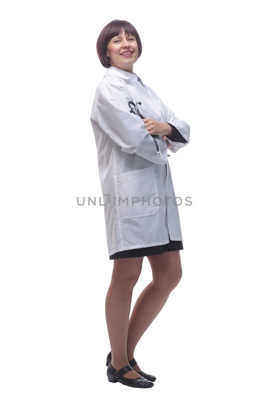 friendly female doctor with a stethoscope in her hands by asdf