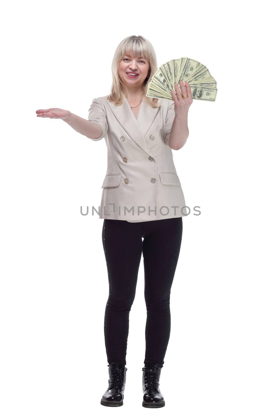 in full growth. happy woman with banknote looking at you. isolated on white background.