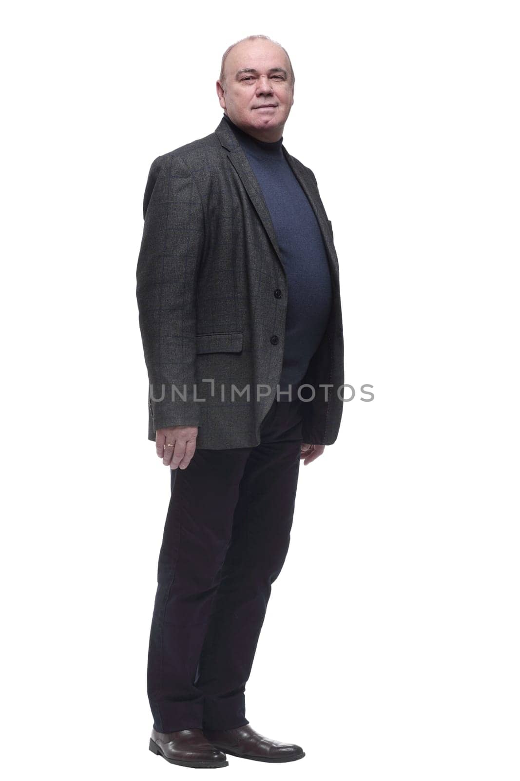 full length . confident senior male looking at a white blank screen. isolated on a white background