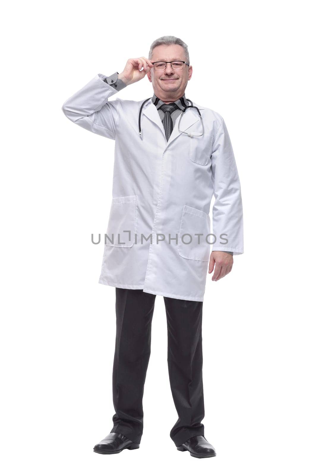 Portrait of smiling caucasian male doctor wear white medical uniform, stethoscope and glasses look at camera and smiling. Confidence concept