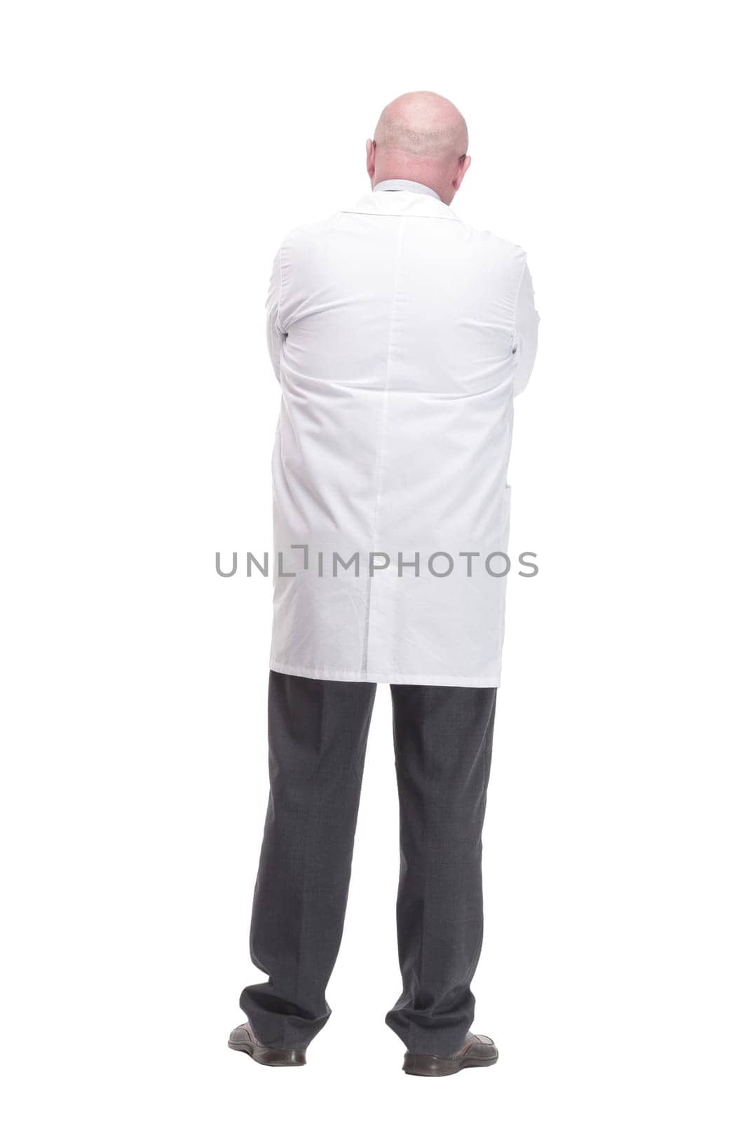 in full growth. successful mature doctor in a white coat .isolated on a white background