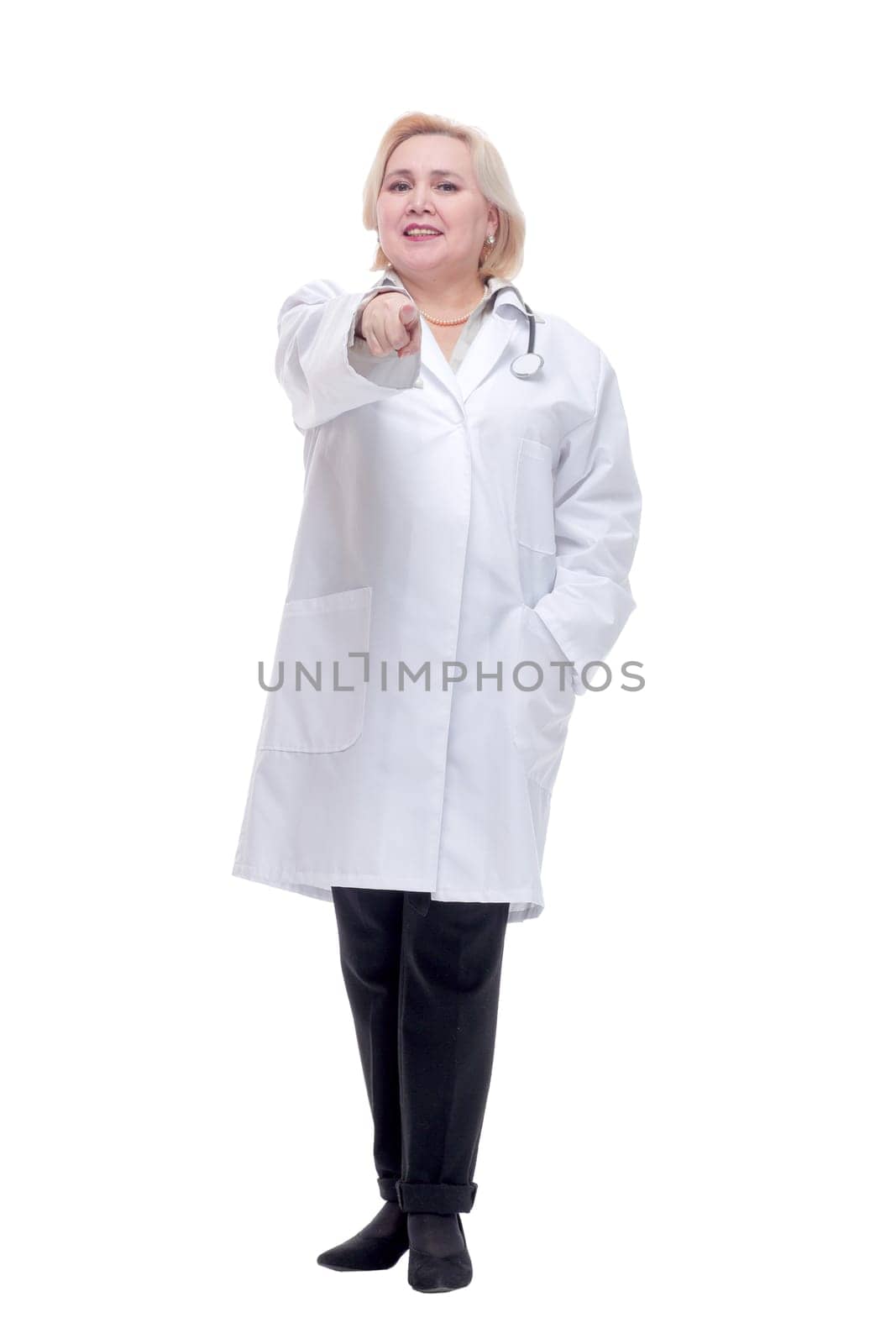 Smiling medical doctor woman with stethoscope by asdf