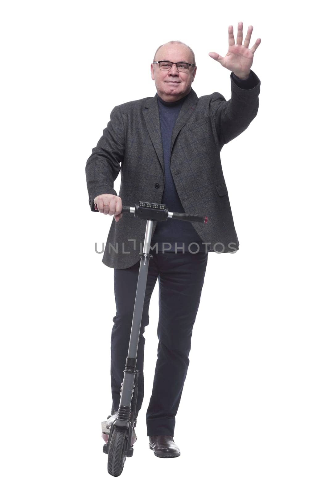 full growth . Mature business man with an electric scooter. isolated on a white background