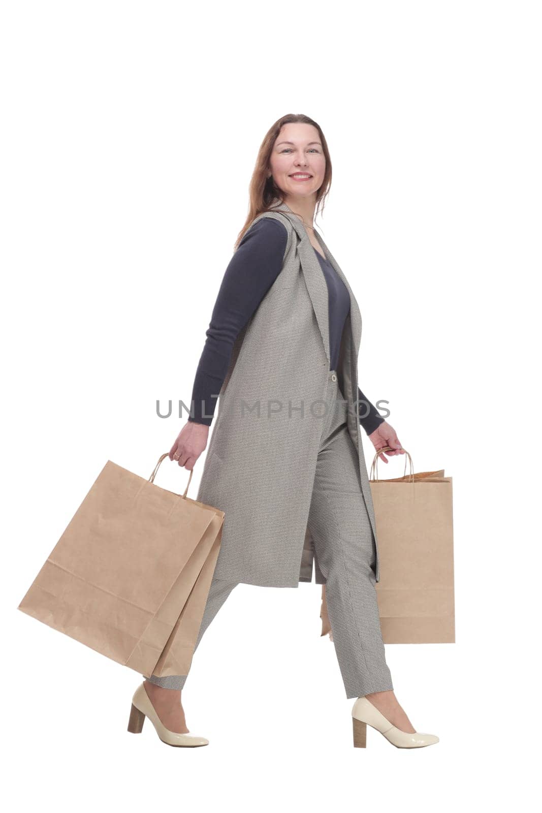 in full growth. elegant woman with shopping bags. by asdf