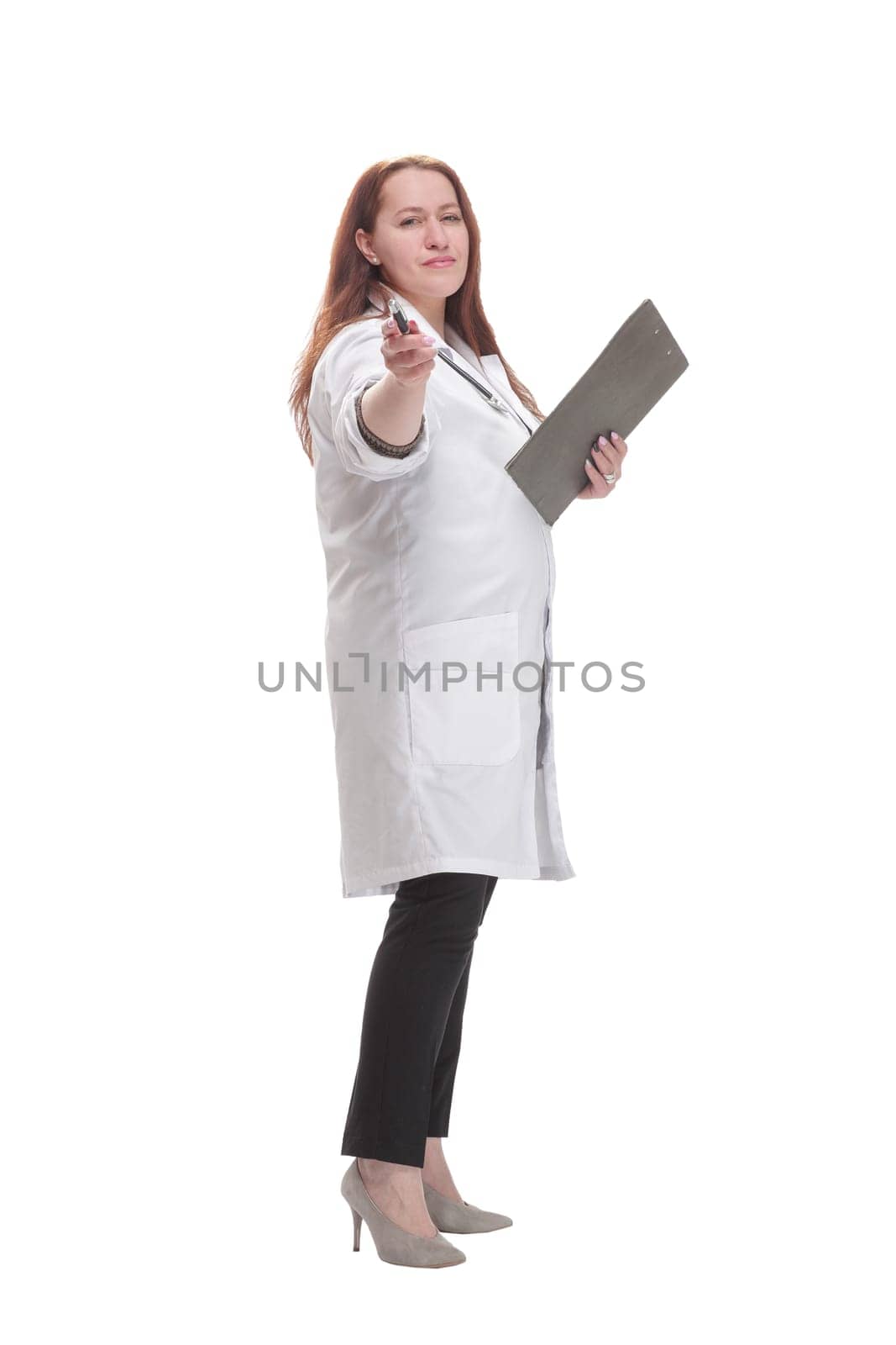 full-length. mature female doctor with clipboard. isolated on a white background.