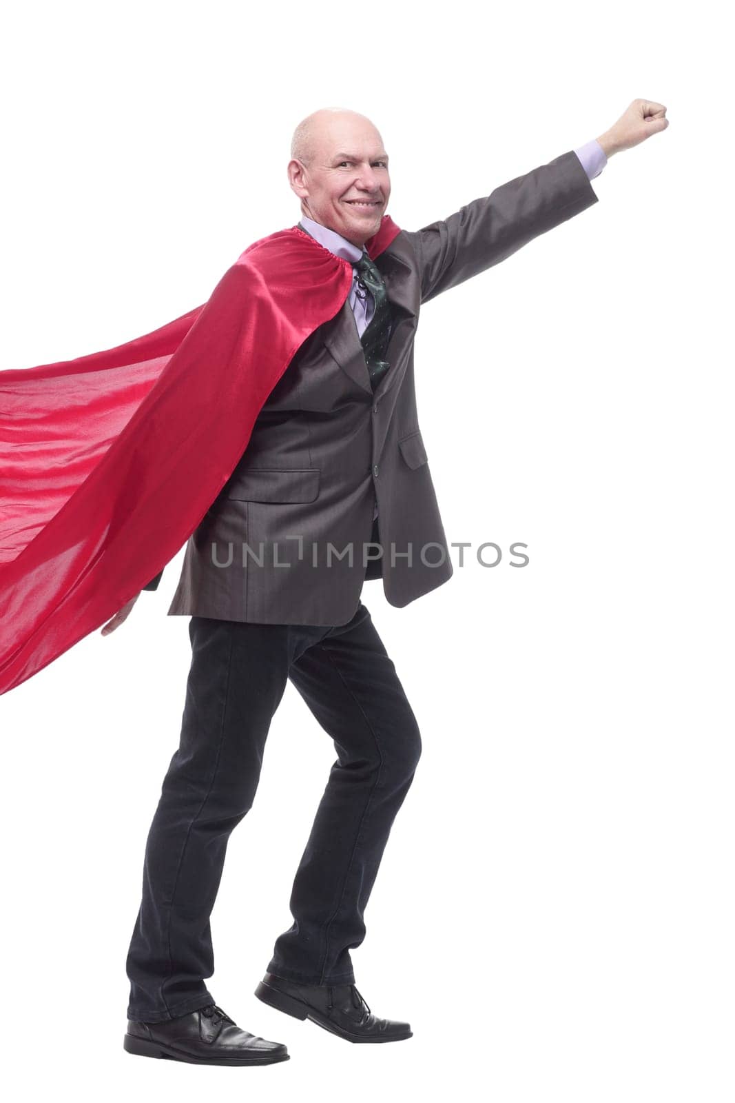 in full growth. business man in a superhero raincoat. isolated on a white background.