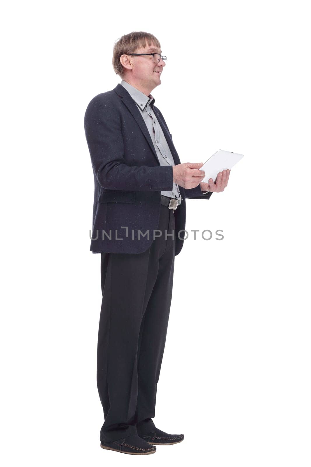 senior business man using a digital tablet . isolated on a white background. by asdf