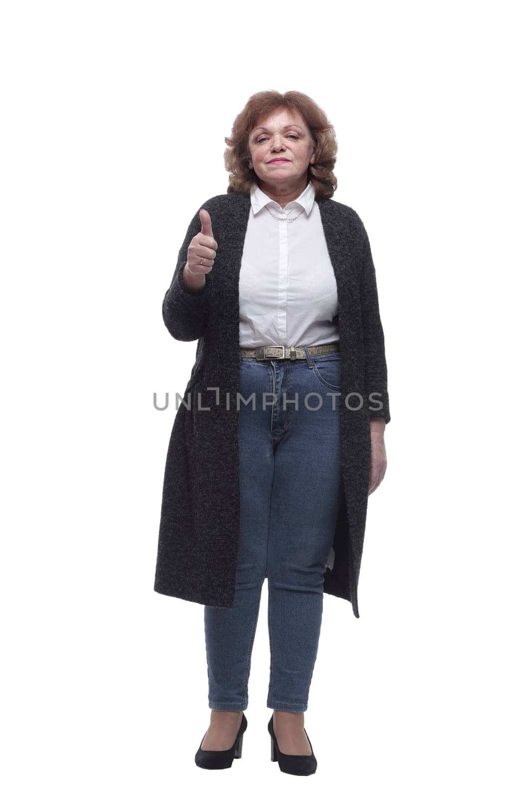in full growth. modern mature woman looking at you. isolated on a white background