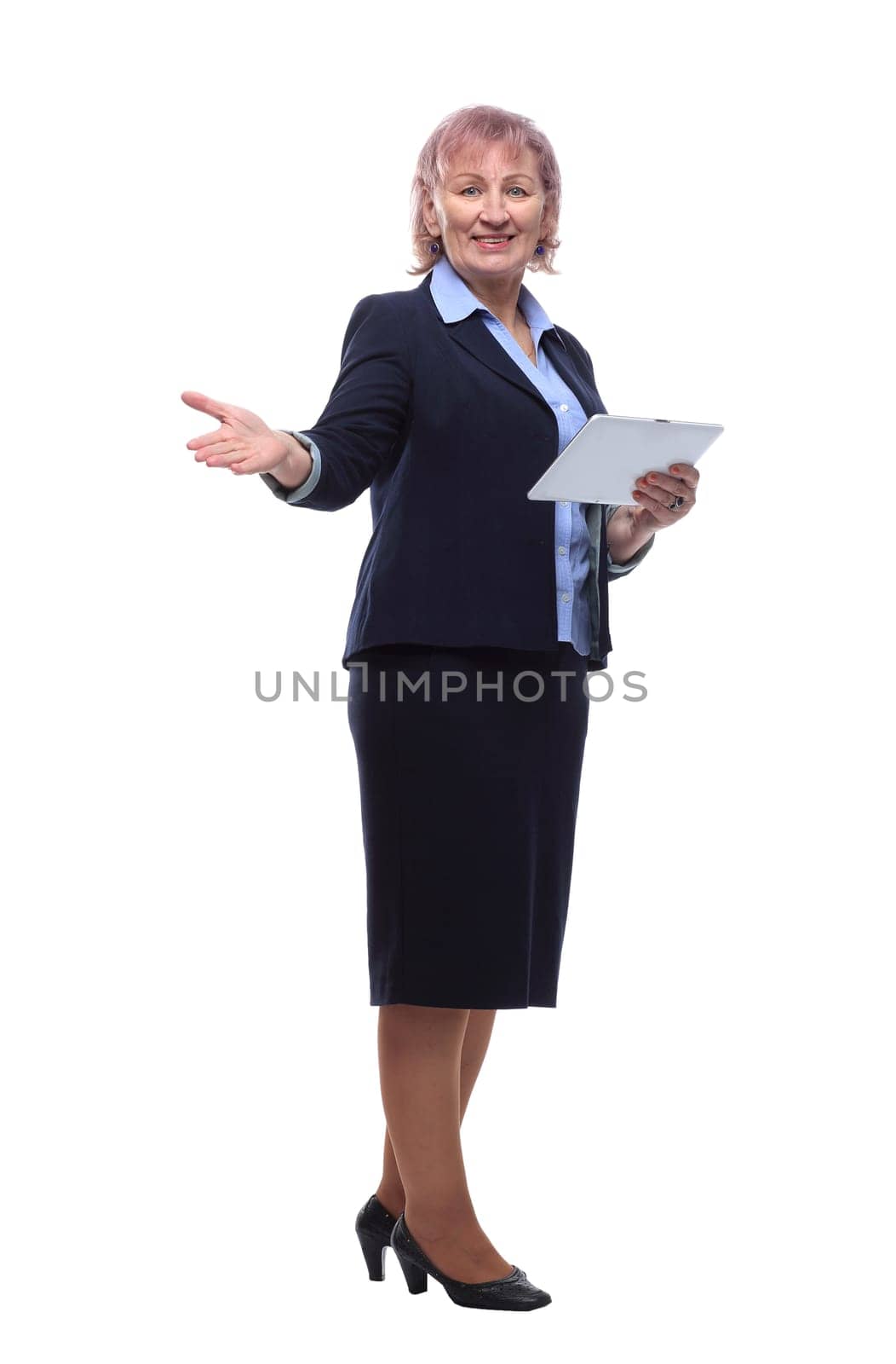 in full growth. friendly business woman with a digital tablet. isolated on a white background