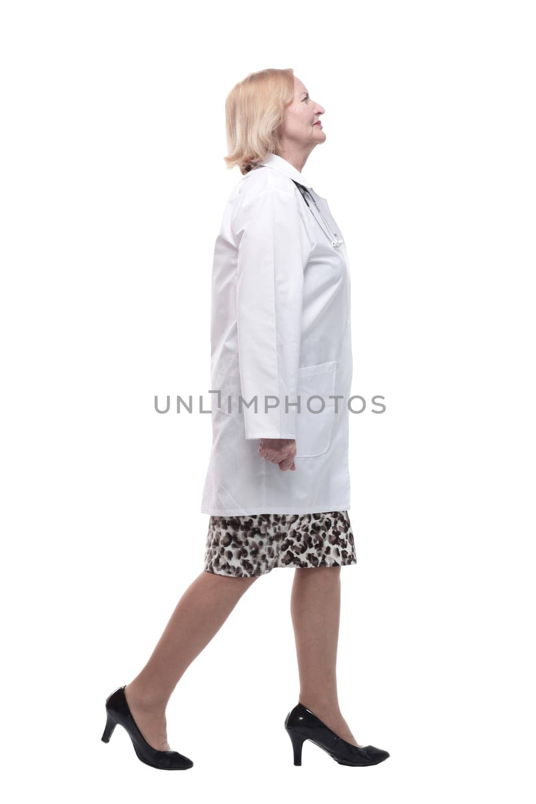 woman doctor in a white coat striding forward. by asdf