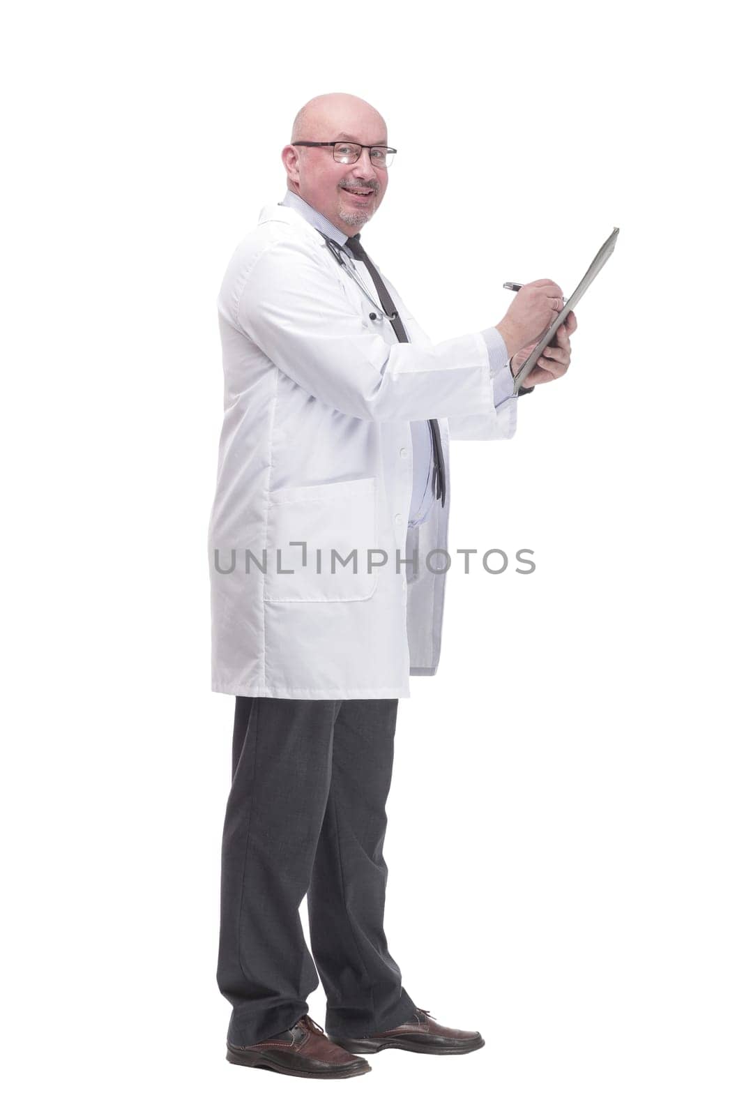 full-length. mature doctor with clipboard .isolated on a white background.