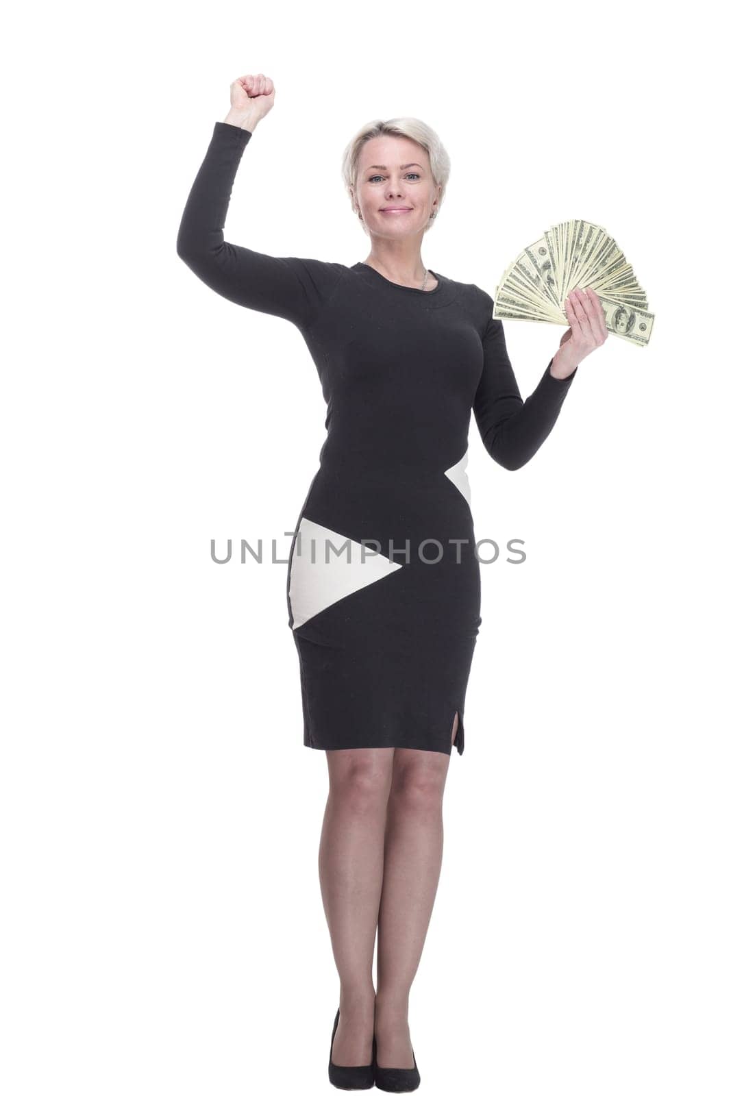 in full growth. elegant woman with a fan of banknotes, showing a thumbs up. isolated on a white background.