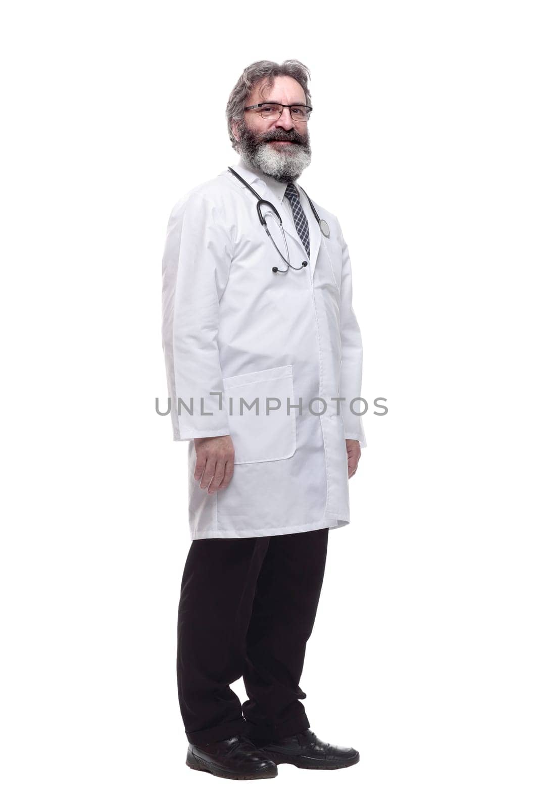 in full growth. senior General practitioner with a stethoscope. isolated on a white background