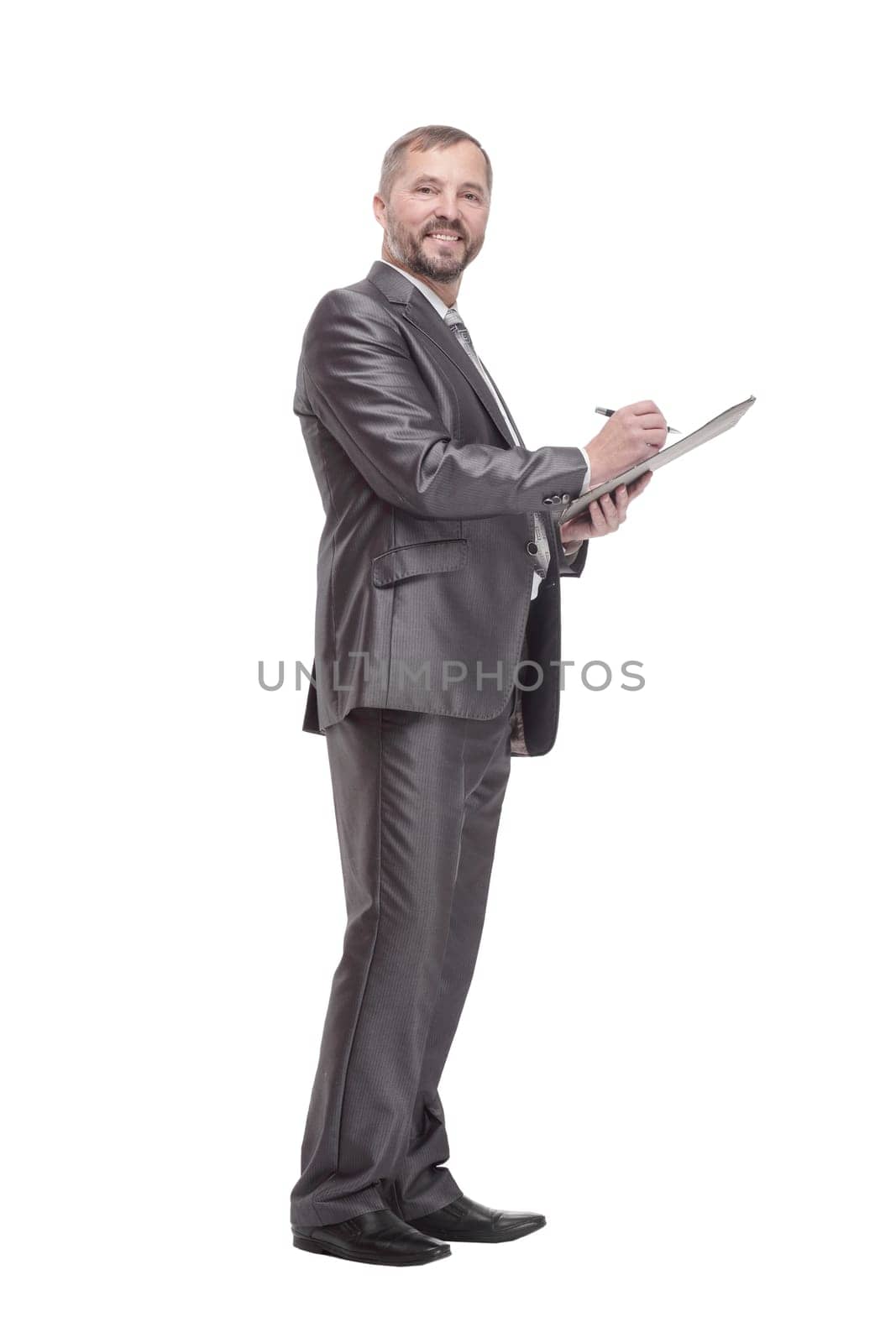 full-length. business man with clipboard. isolated on a white background.