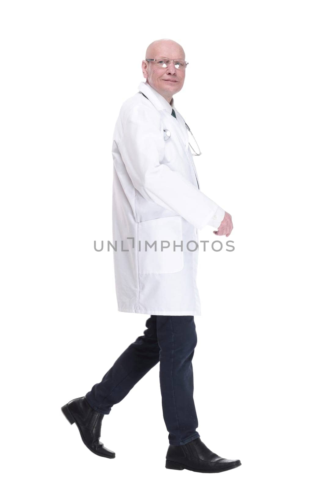 man doctor striding forward confidently . isolated on a white background. by asdf