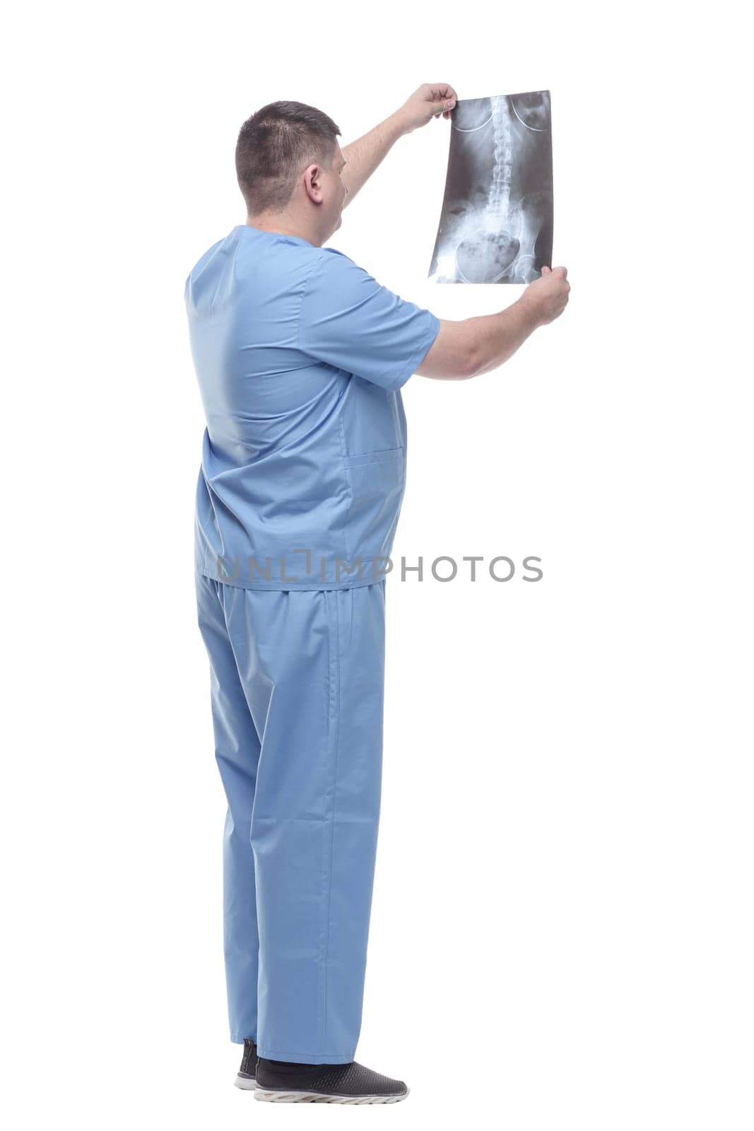 male medic with a chest x-ray. isolated on a white background.