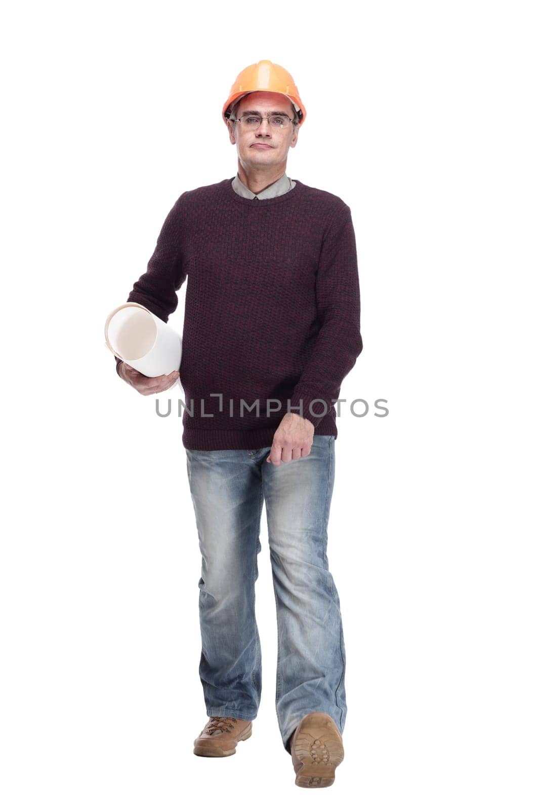 man in a protective helmet with drawings of a new project . isolated on a white background.