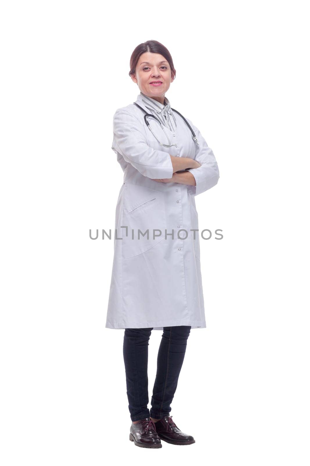Portrait of woman doctor with white coat crossing arms and stethoscope around the neck