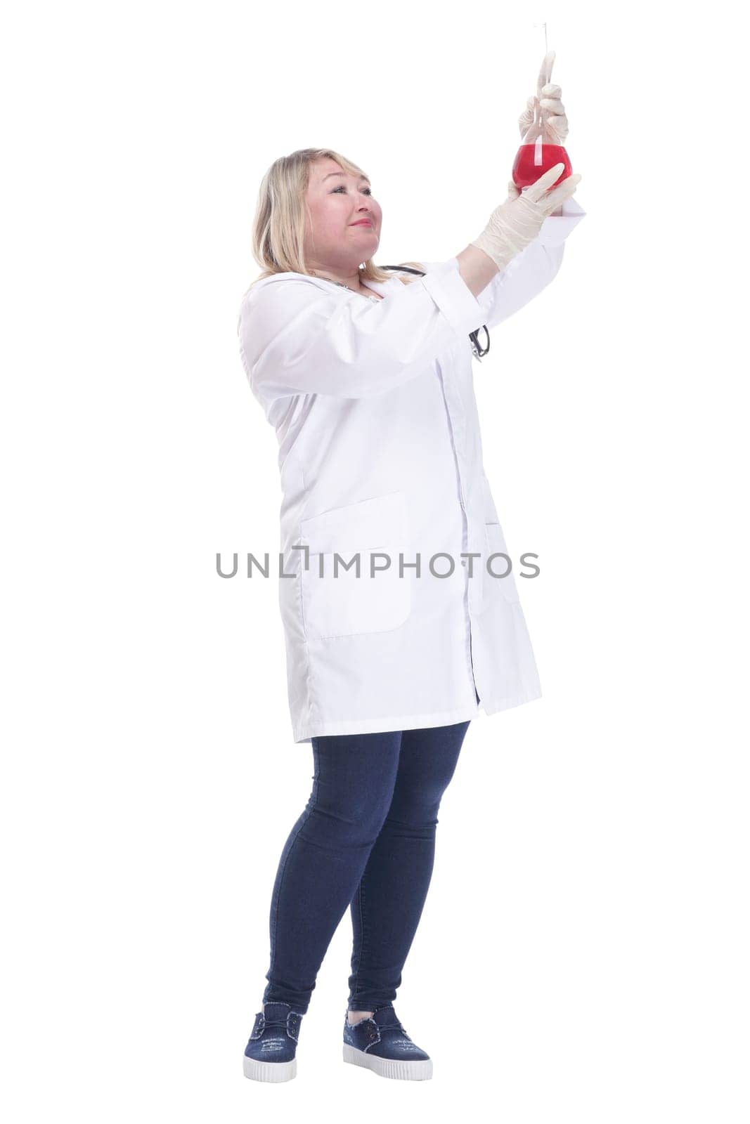 smiling woman doctor with a laboratory flask . isolated by asdf