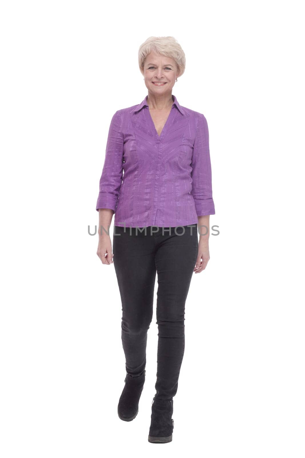 in full growth. attractive mature woman in casual clothing. isolated on a white background.