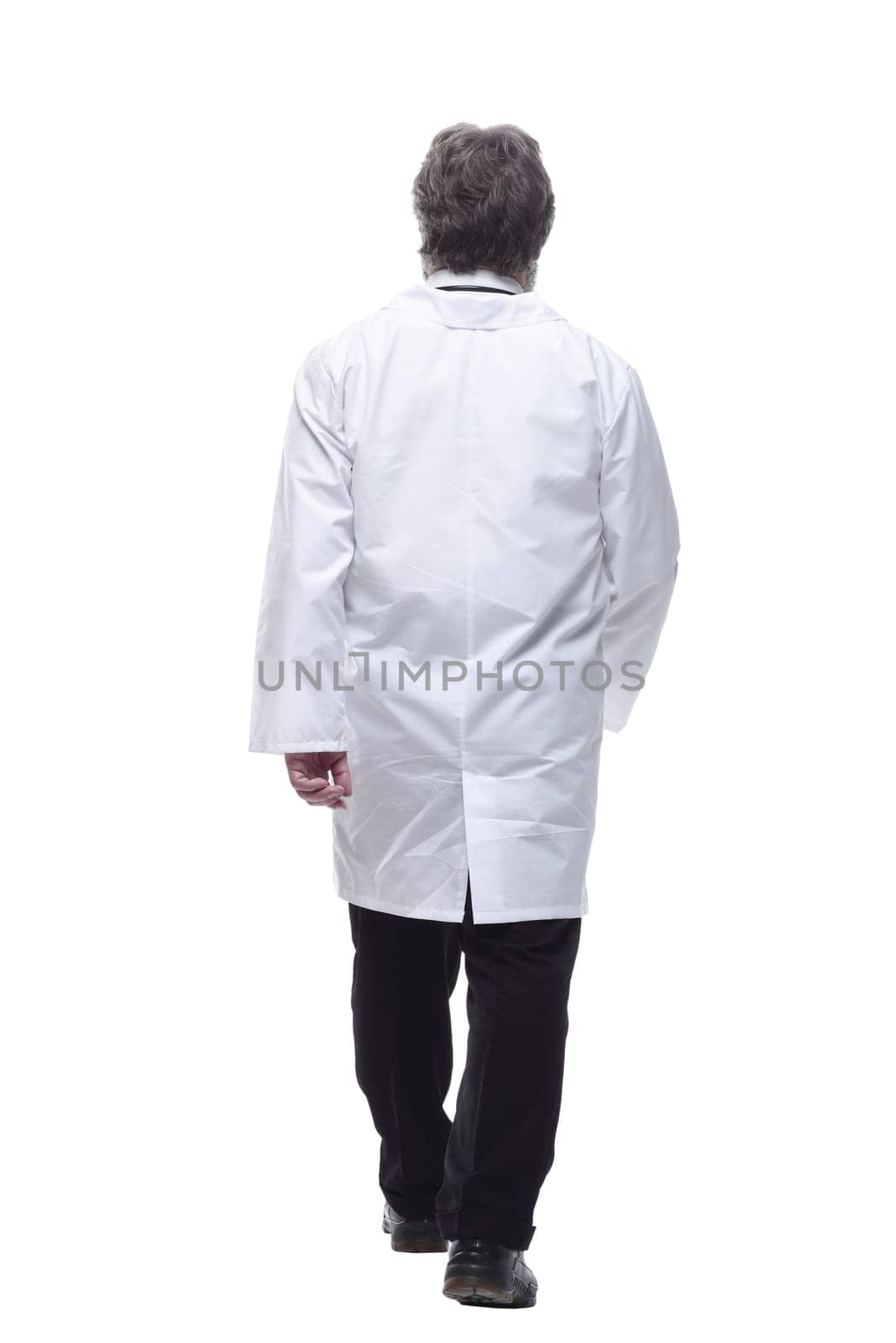 confident male doctor rushes to the call. isolated on a white by asdf