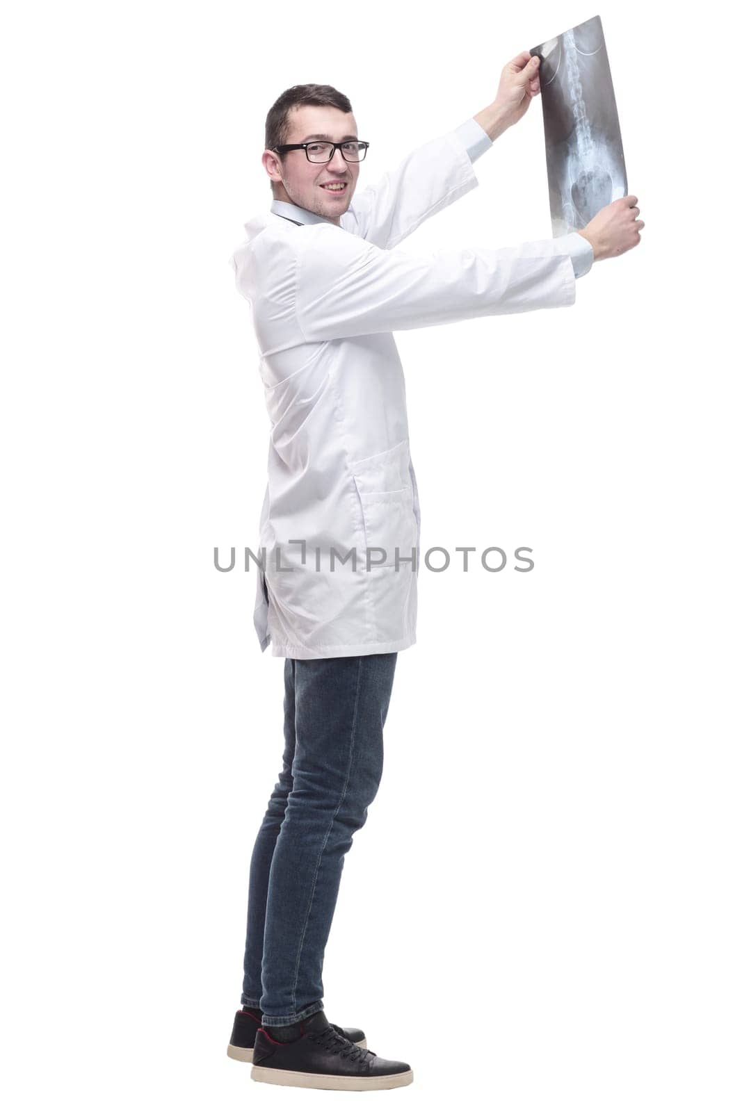 doctor with an x-ray in his hands. isolated on a white by asdf