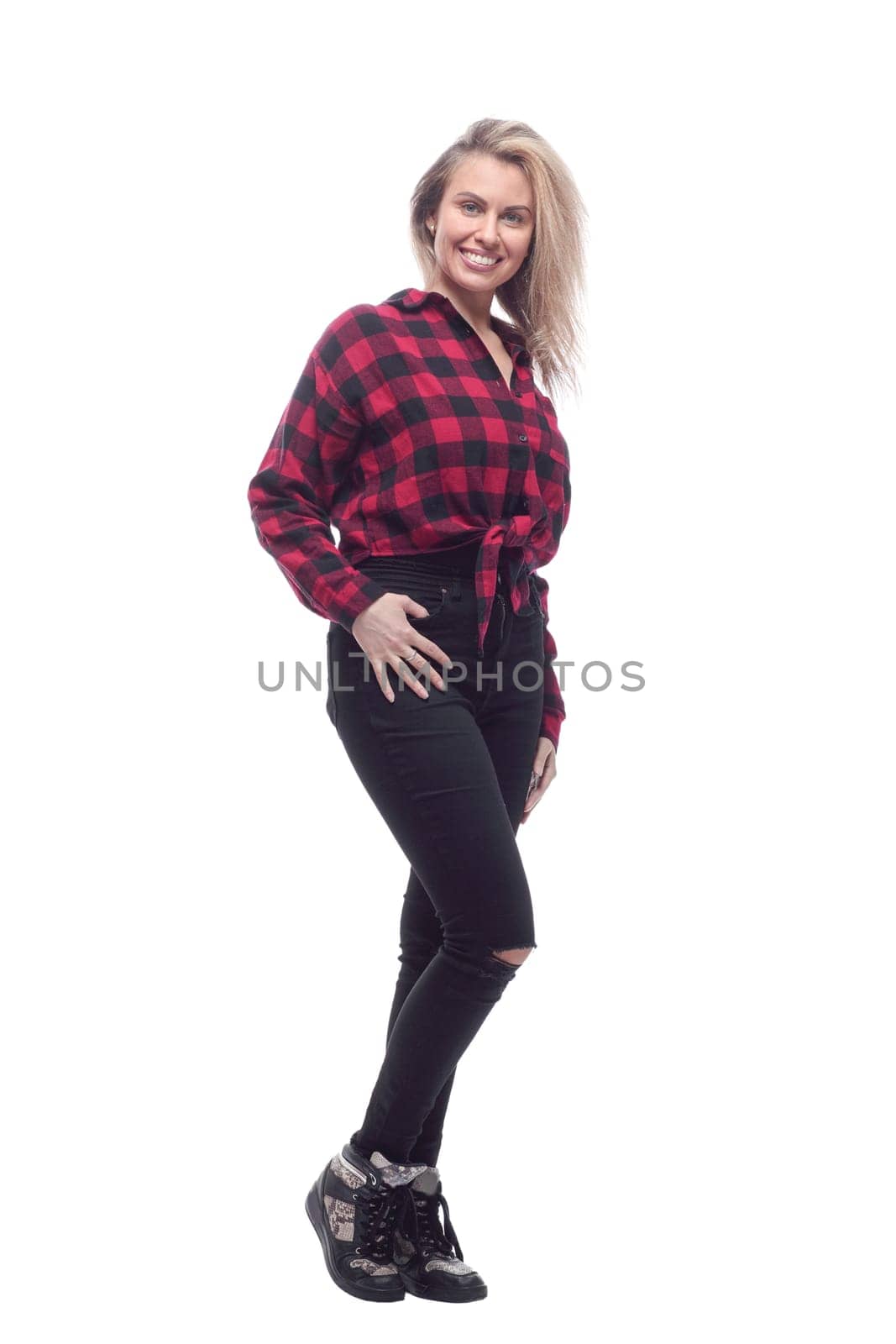 in full growth. happy young woman in fashionable clothes looking at you. isolated on white background.