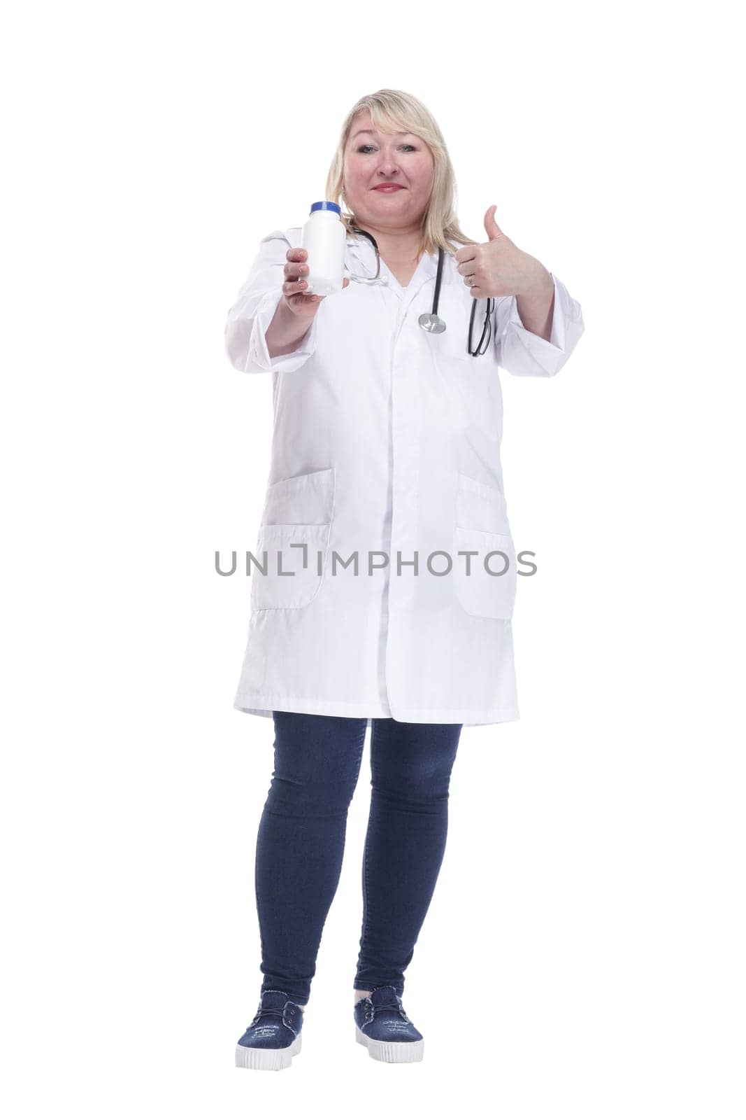 in full growth. woman doctor with an antiseptic in her hands. isolated on a white background.