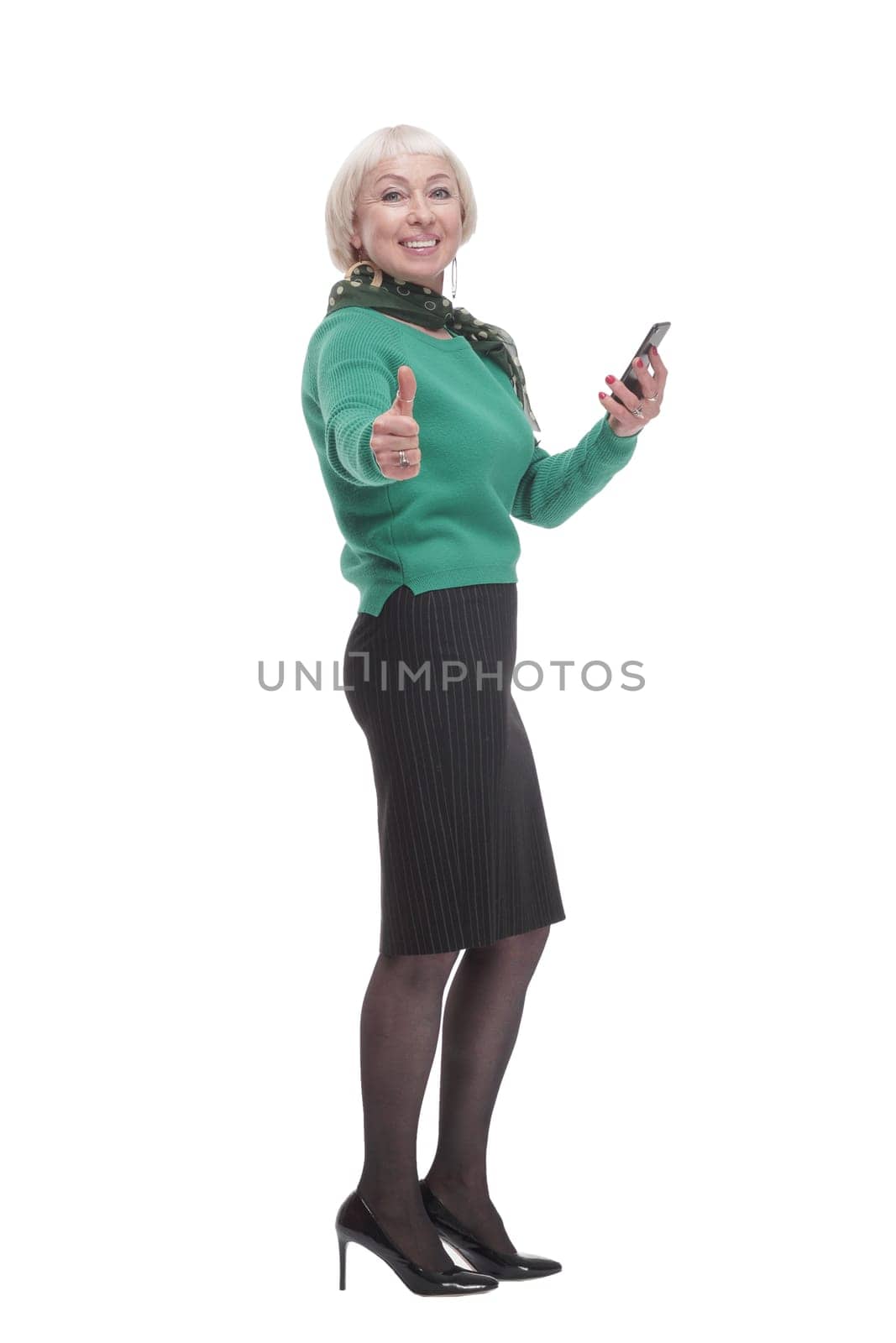 in full growth. attractive woman with a smartphone. by asdf