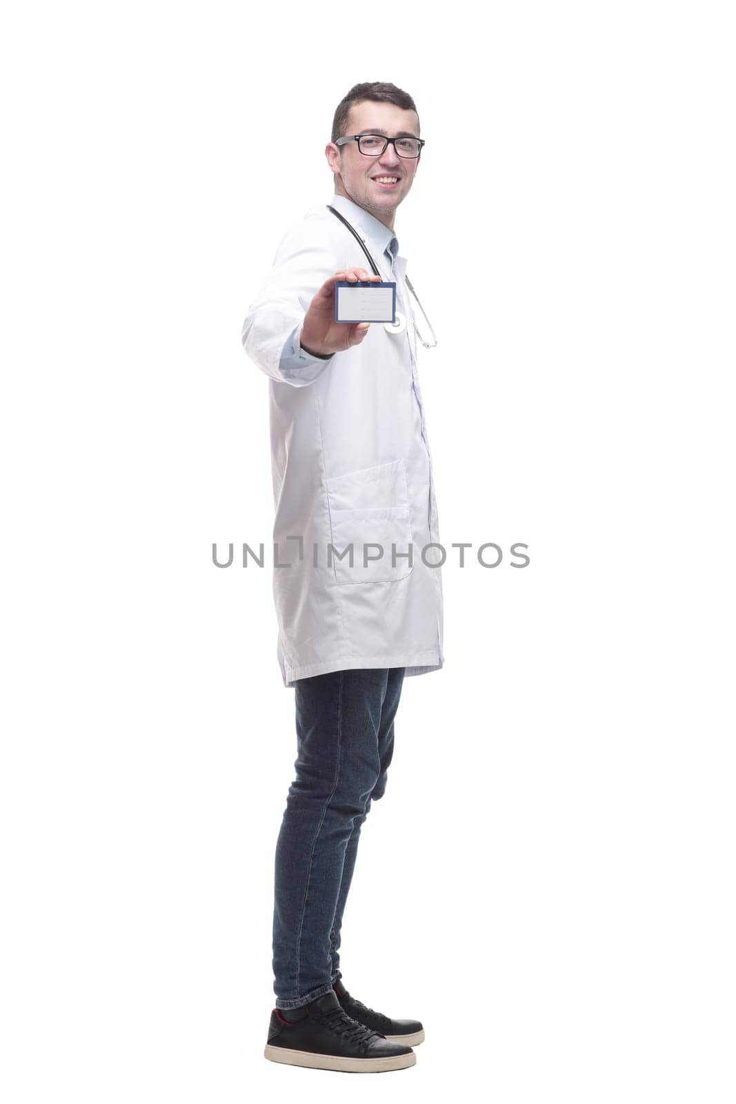 doctor with a stethoscope showing his business card. by asdf