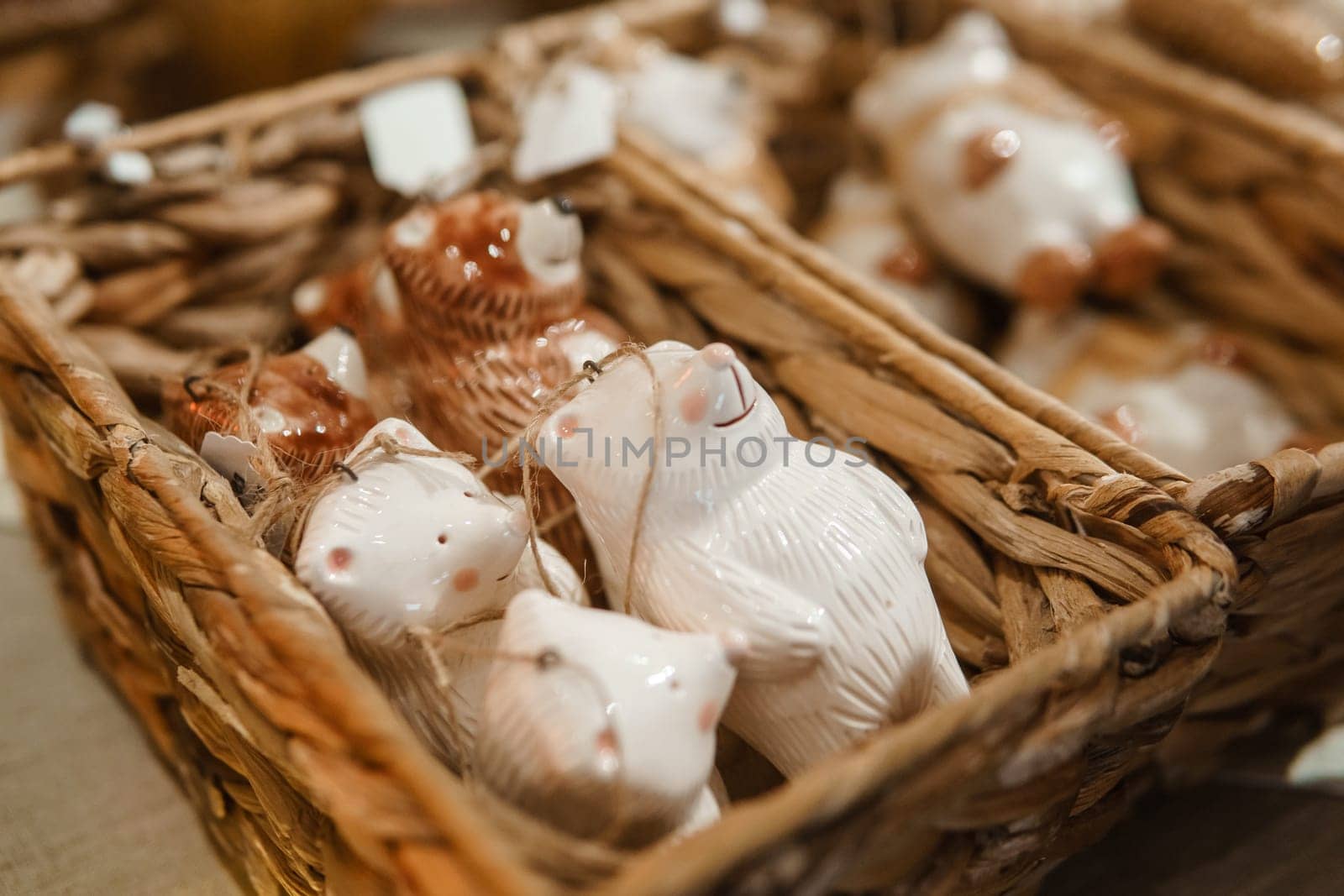 Sale of handmade ceramic Christmas tree toys at the Christmas Fair. Black Friday for the winter holidays