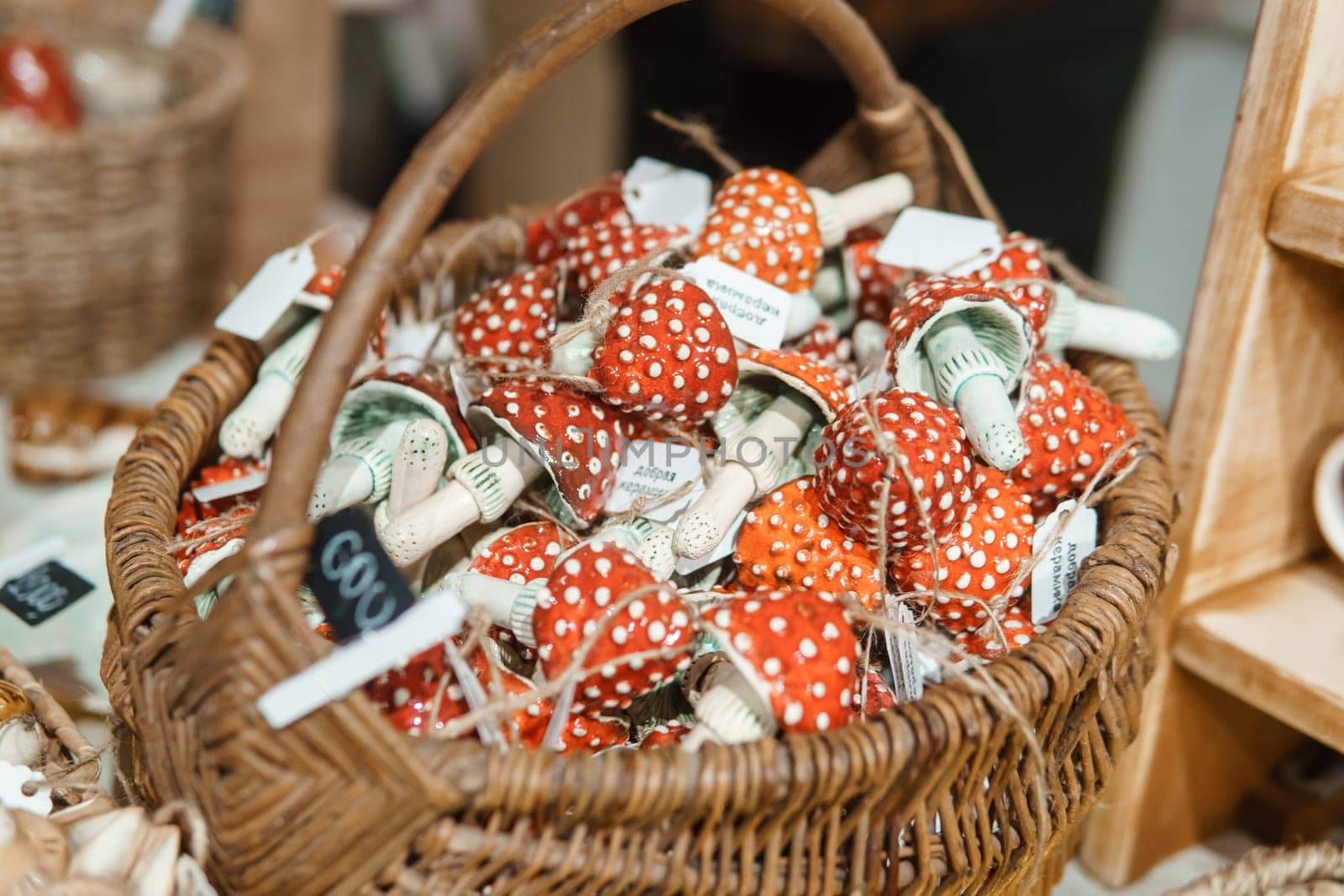 Sale of handmade ceramic Christmas tree toys at the Christmas Fair. Black Friday for the winter holidays
