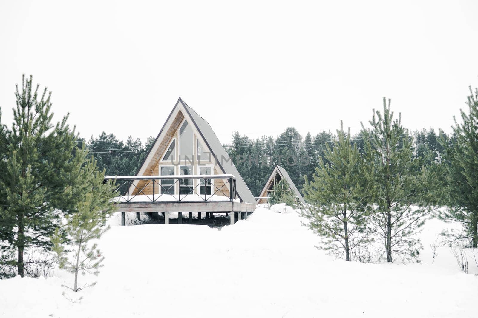A country house in nature in winter. Rest in an ecologically clean place in winter. Glamping in nature
