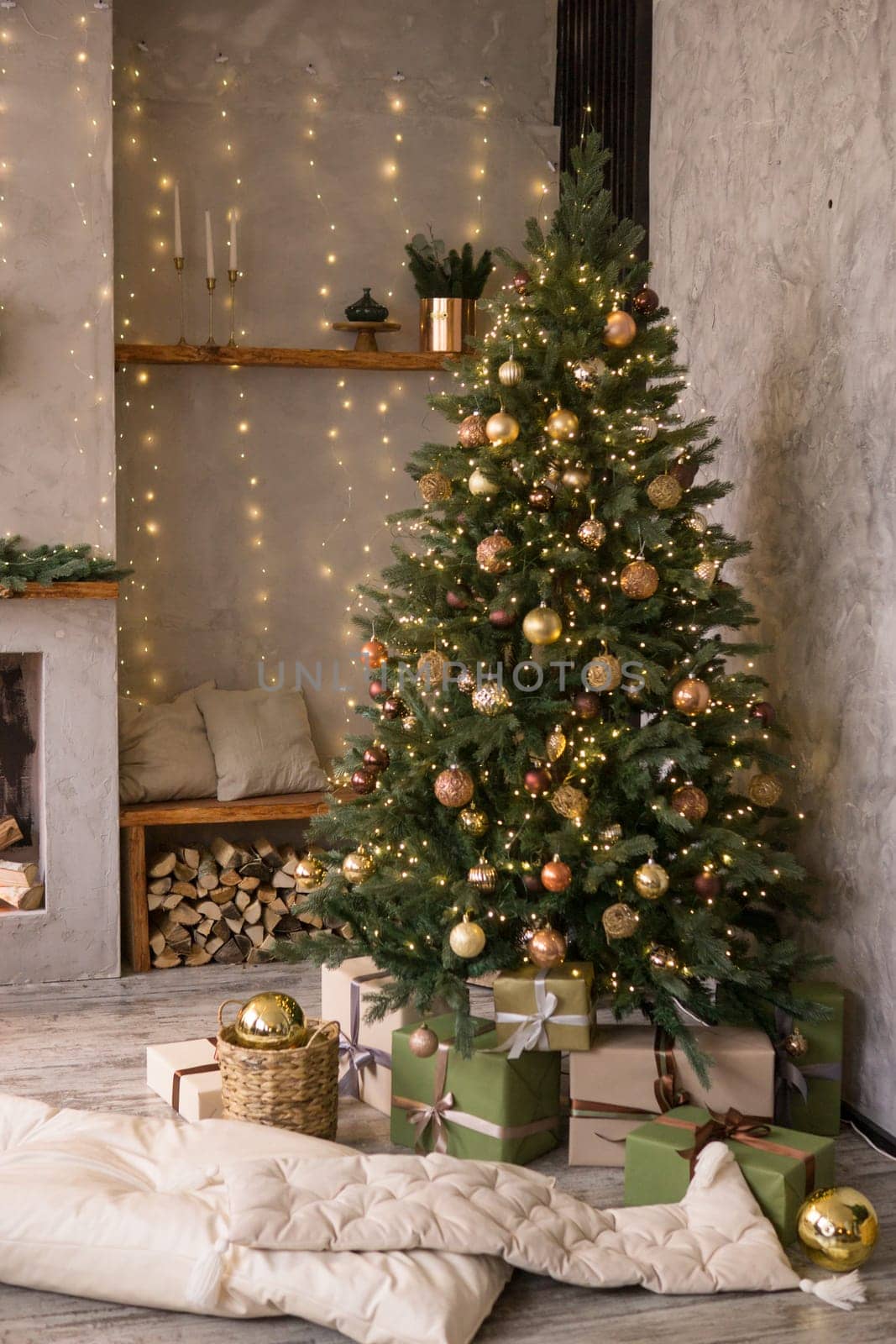 Home New Year's interior. Christmas tree with gifts, decorated with garlands. Cozy atmosphere of a home holiday, loft design of the room, Scandinavian style