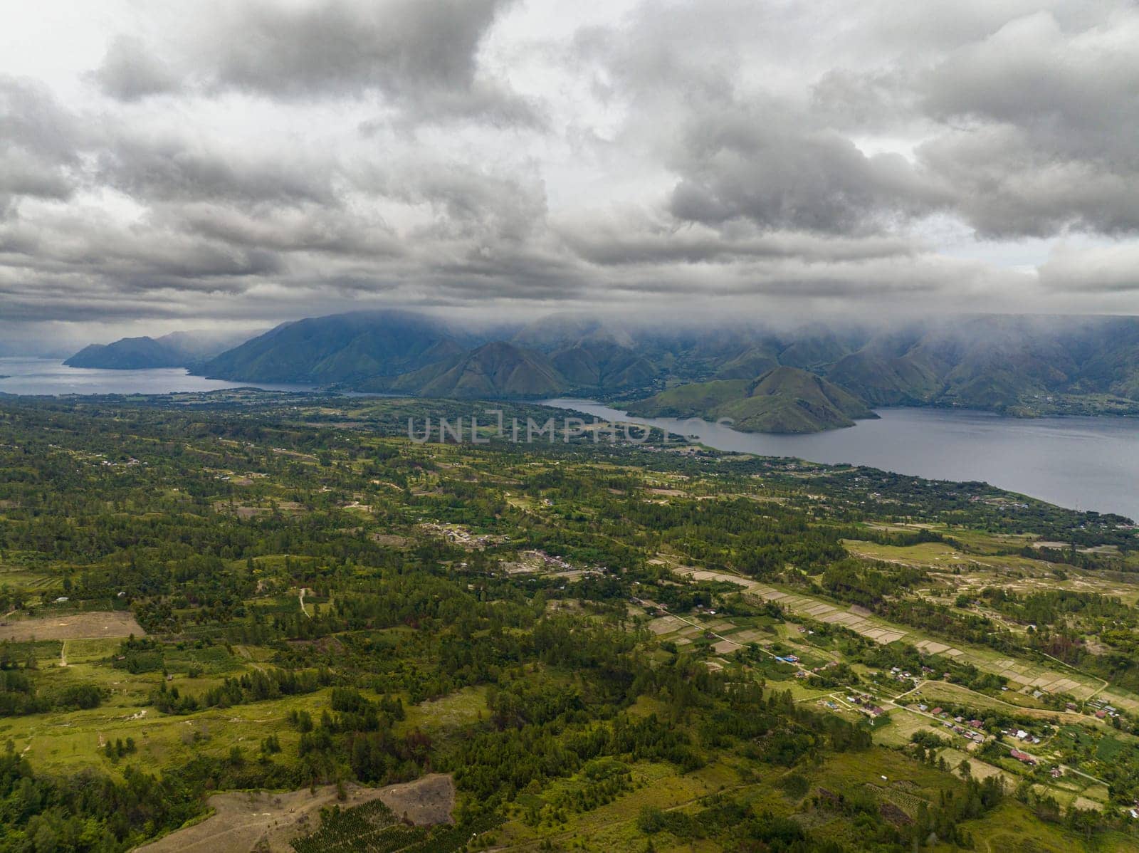 Farmland on Samosir Island and Lake Toba. Sumatra, Indonesia.