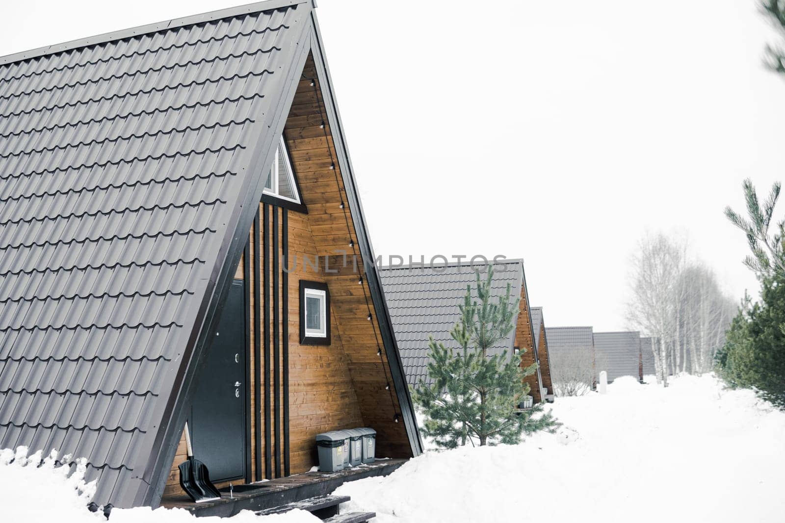 A country house in nature in winter. Rest in an ecologically clean place in winter. Glamping in nature