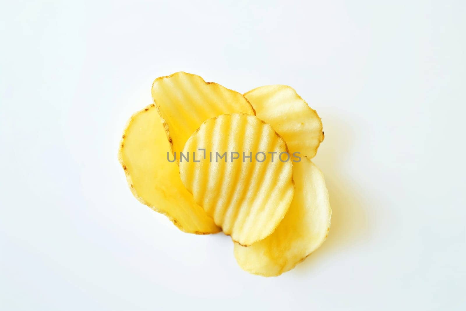 Crunchy salted potato chips for a delicious snack food