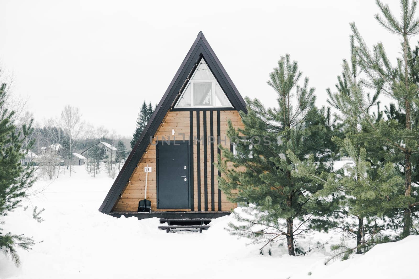 A country house in nature in winter. Rest in an ecologically clean place in winter. Glamping in nature