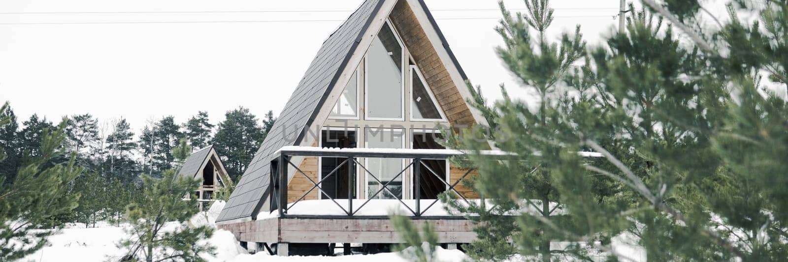 A country house in nature in winter. Rest in an ecologically clean place in winter. Glamping in nature
