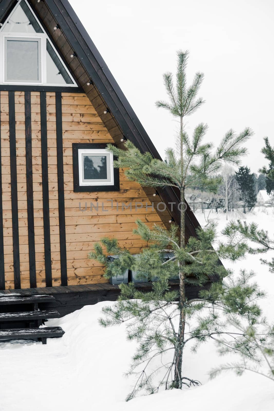 A country house in nature in winter. Rest in an ecologically clean place in winter. Glamping in nature