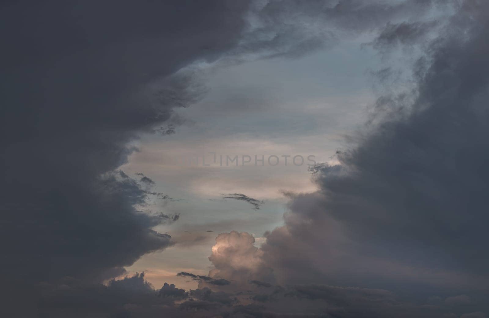 The sky is being covered with amazing clouds. Beautiful clouds like a heaven sky toward the light, Concept idea of Imaginative clouds nature, Nature abstract composition for background wallpaper and textures, Space for text, Selective focus.