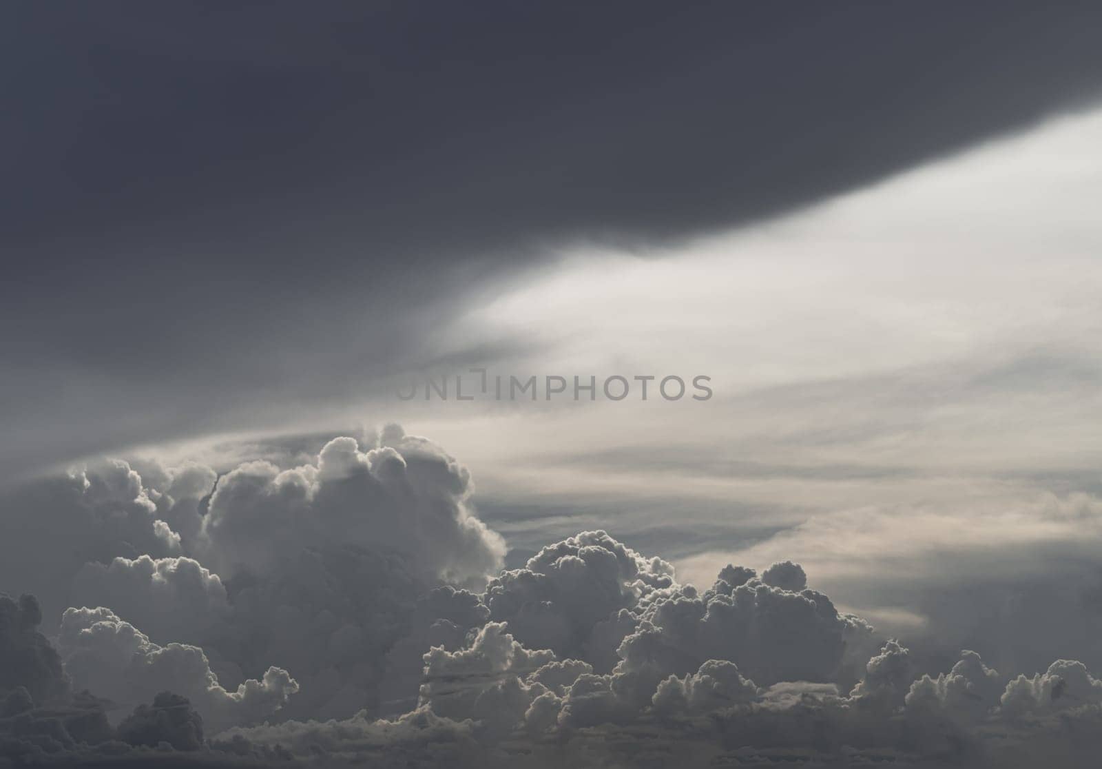 The sky is being covered with amazing clouds. Beautiful clouds like a heaven sky toward the light, Concept idea of Imaginative clouds nature, Nature abstract composition for background wallpaper and textures, Space for text, Selective focus.