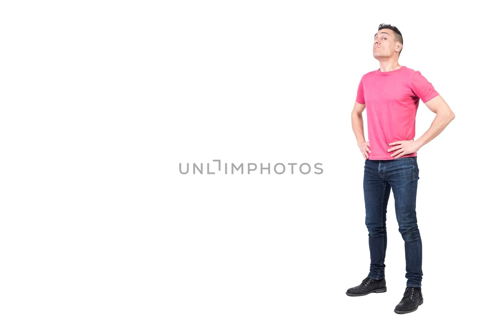 Full body of male guard looking at camera with serious face while standing with hands on waist isolated on white background