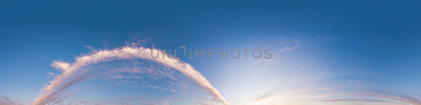 Bright sunset sky panorama with Cirrus clouds. Seamless hdr spherical equirectangular 360 panorama. Sky dome or zenith for 3D visualization, game and sky replacement for aerial drone 360 panoramas.