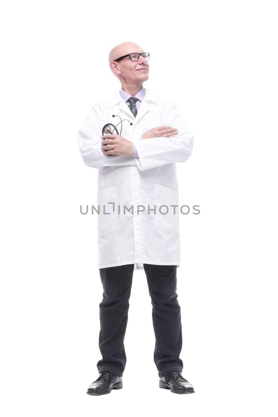 in full growth. confident doctor with a stethoscope in hand. isolated on a white background.