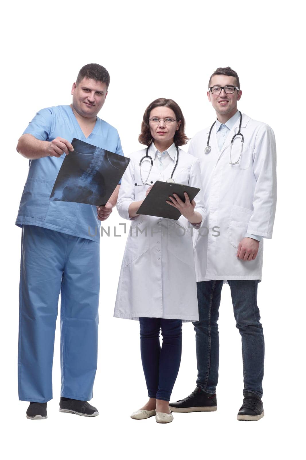 in full growth. medical colleagues discussing the x-ray. isolated on a white background.